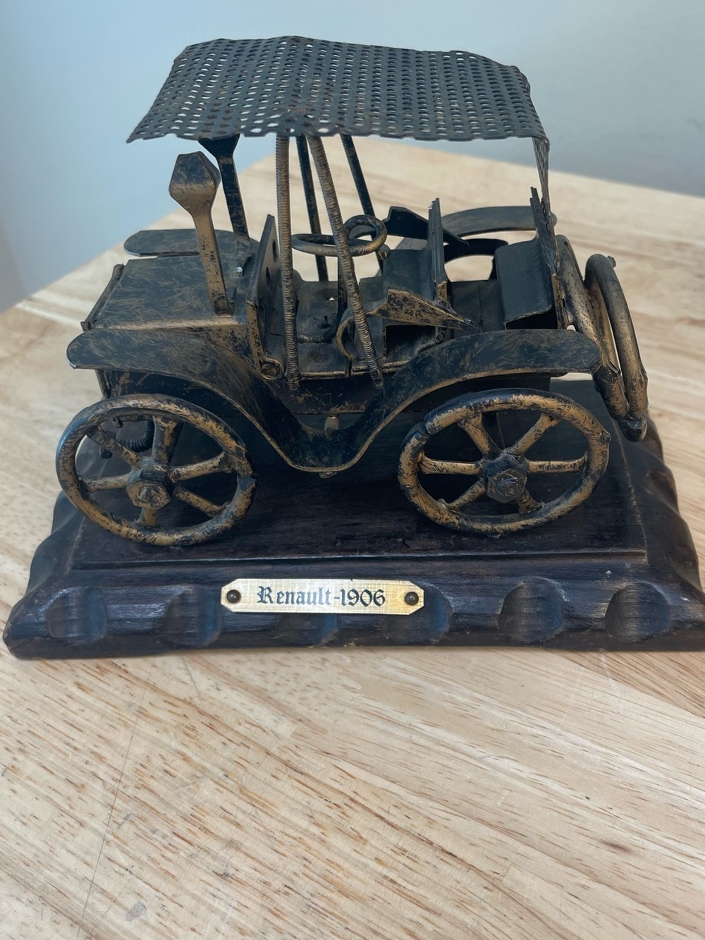 vintage Renault 1906 handmade scrap metal artistry from dark metal